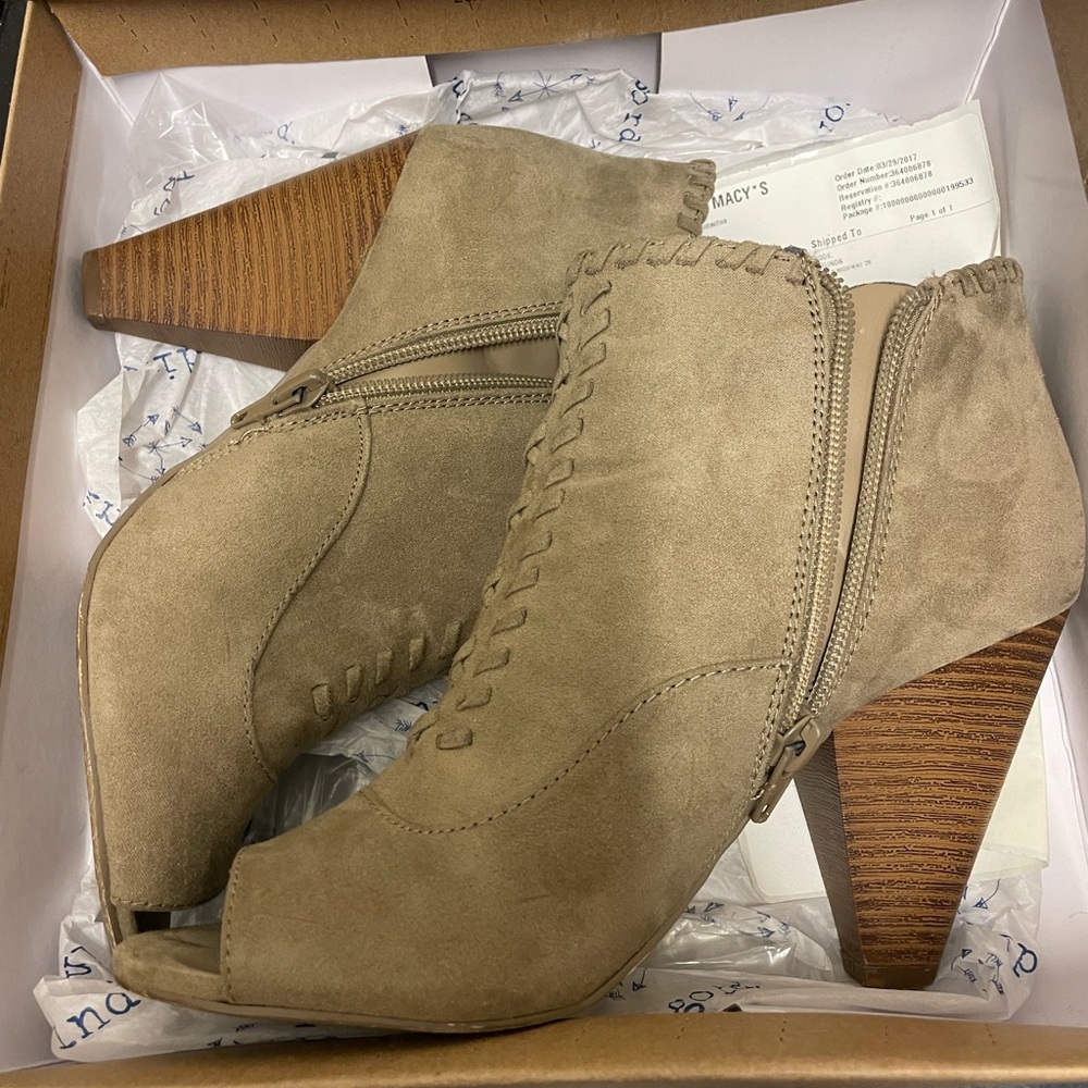 Indigo brand tan ankle booties.